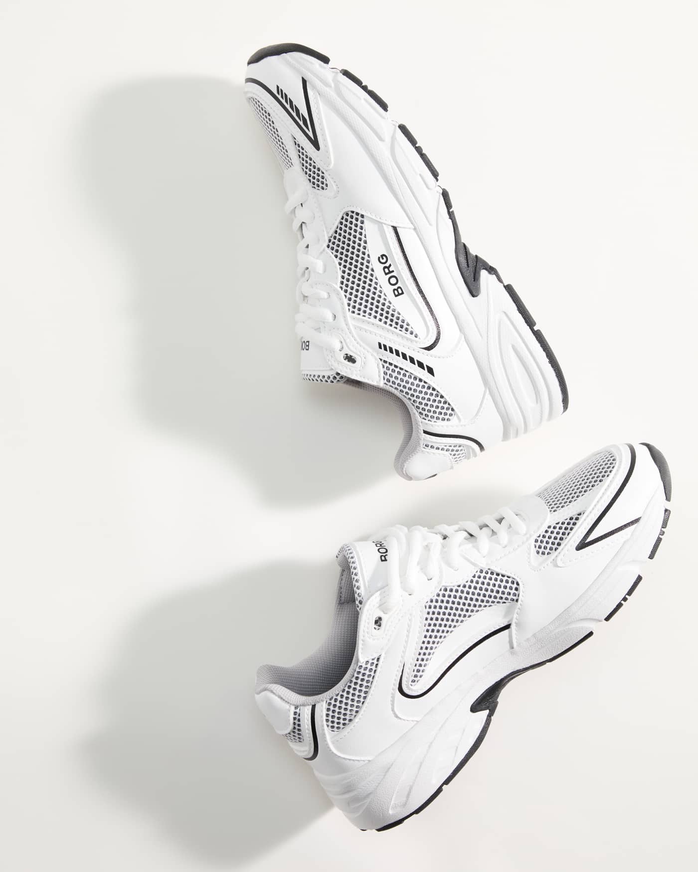 Women's Grand Sneakers in White with a black logo, mesh and synthetic leather for running and training performance. - Image 1