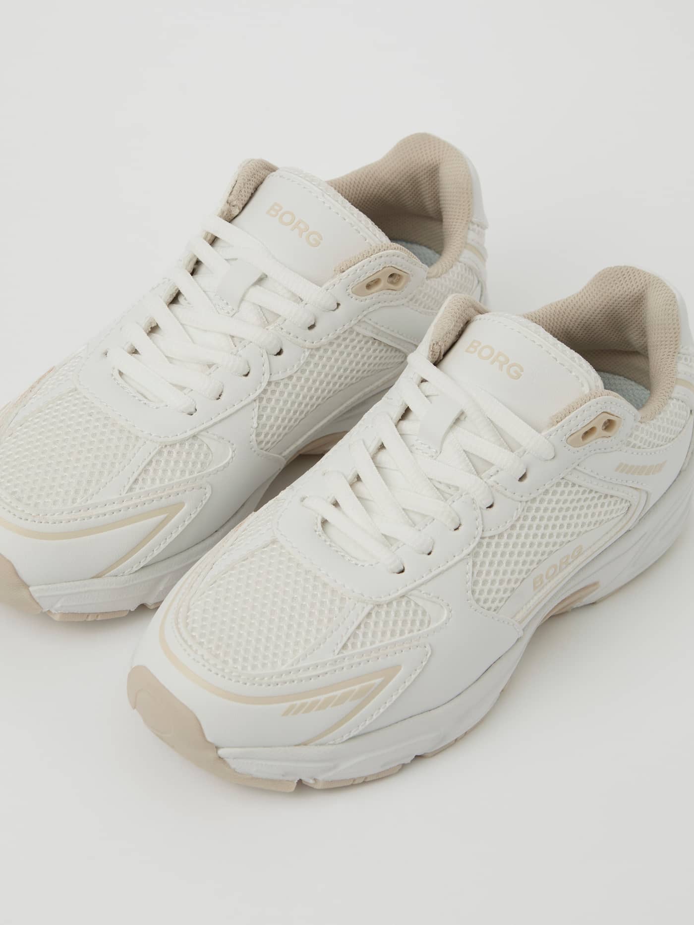 Beige Women's Grand Sneakers featuring breathable mesh, a tan BORG logo, and synthetic leather for training and running. - Image 2