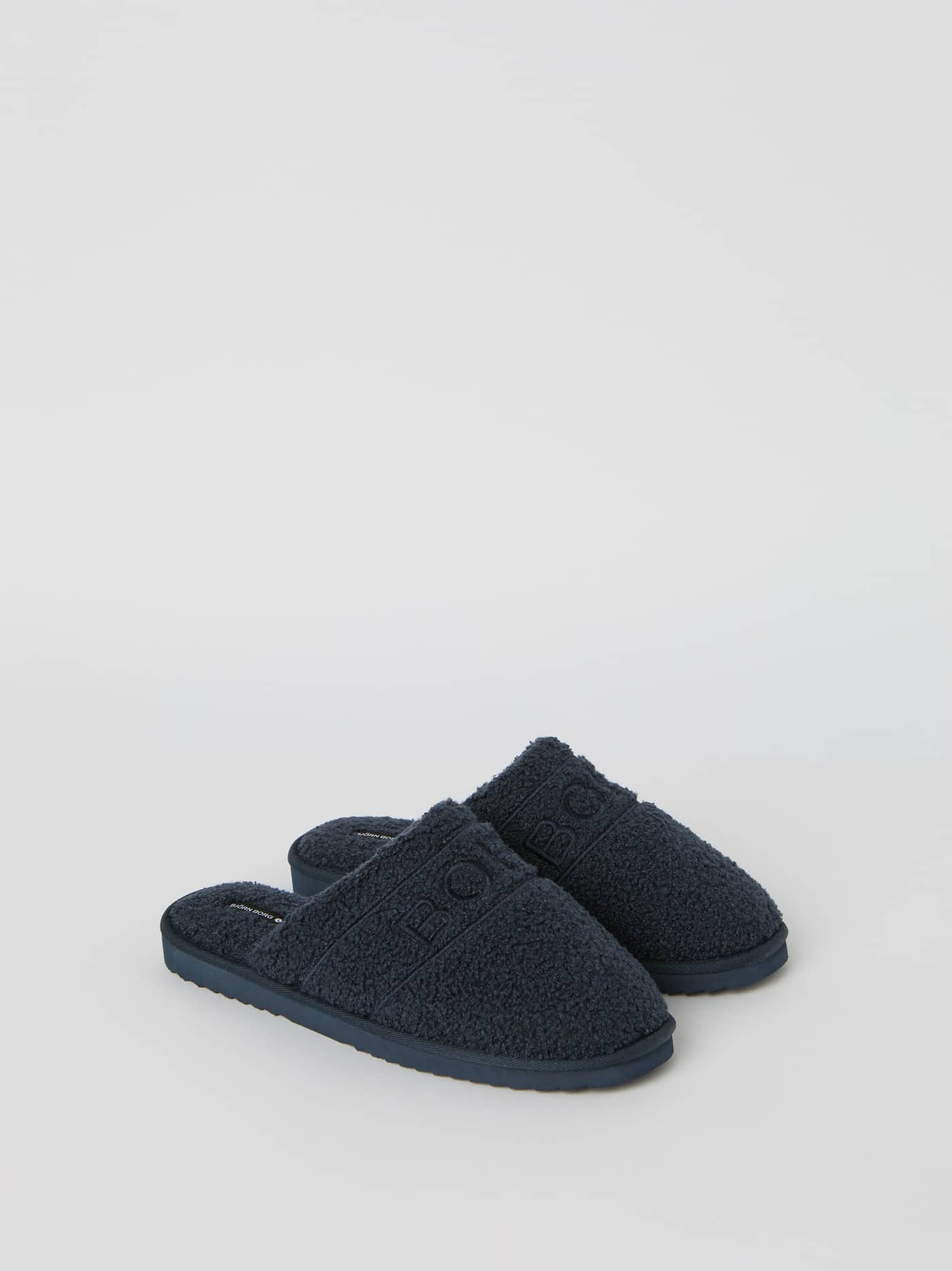 Men's Slippers Homy i Navy med blød, ulden tekstur og broderet Borg-logostribe set fra siden. - Image 1