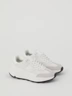White Women’s Sneakers R1300 featuring a chunky rubber sole and silver BORG logo, for running performance and a stylish fit.