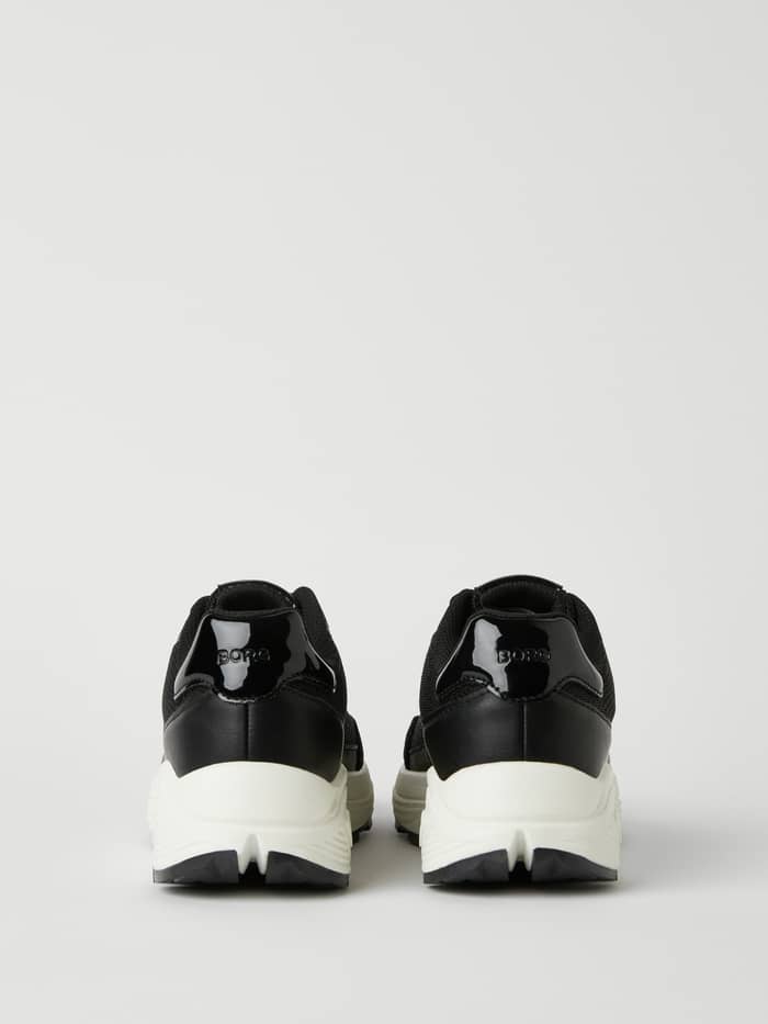 Women's R1300 Sneakers i Sort set bagfra med kraftig sål og tonale logoer, perfekt til løb og træning. - Image 3