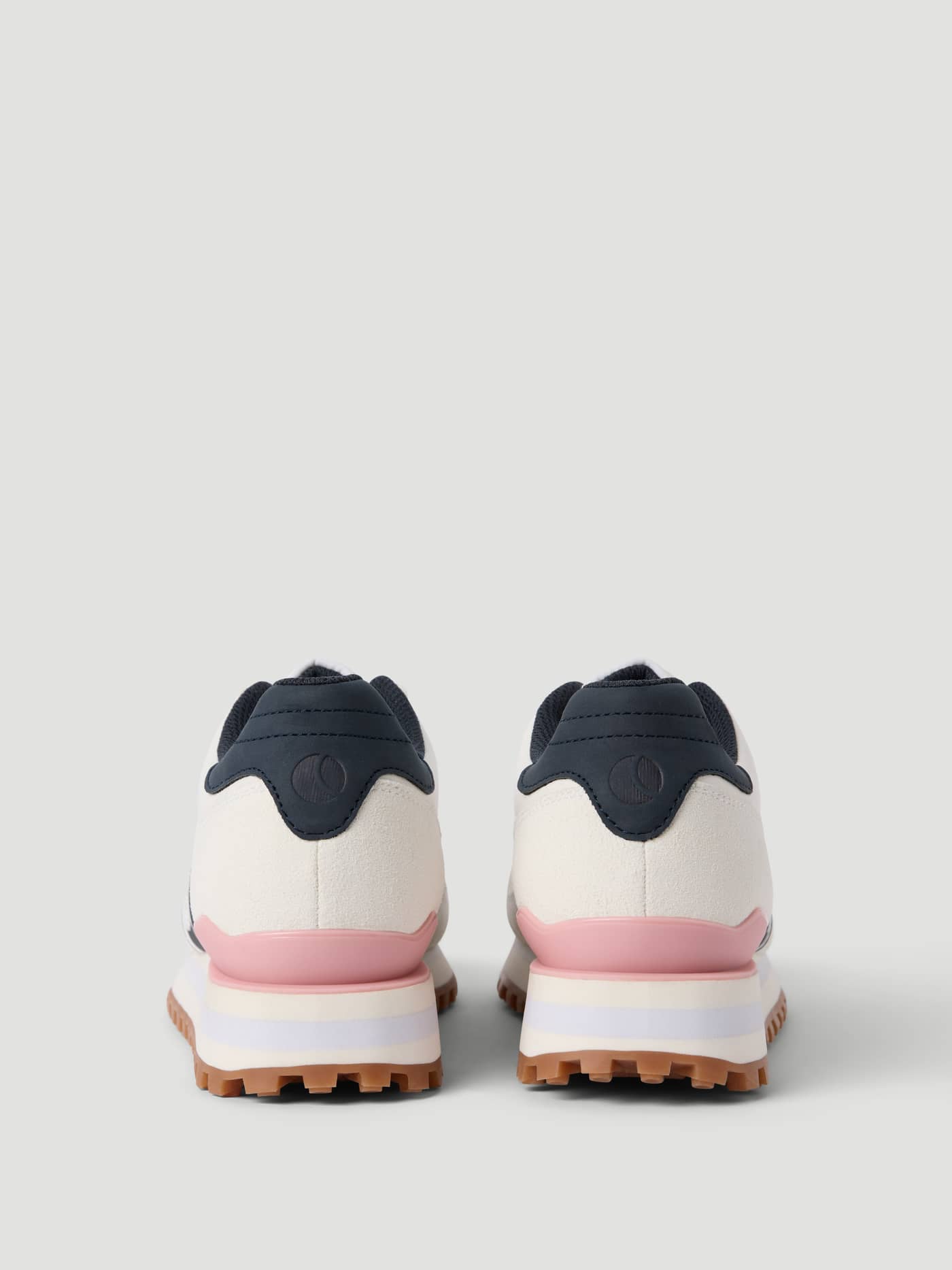Back view of the white Women's Dash Sneakers for running, featuring navy and pink accents and a high rubber outsole. - Image 3