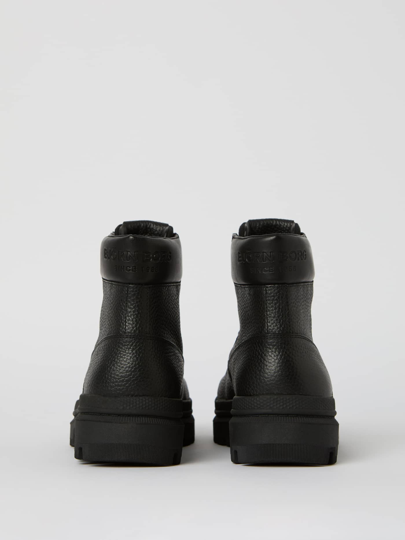 Back view of the black leather Men's Boots H700 Hiker High featuring a black embossed logo and sturdy rubber sole. - Image 2