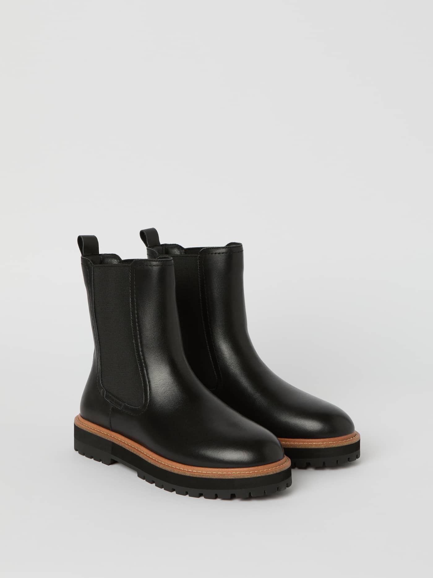 Three-quarter view of the black Björn Borg Women's Chelsea Boots H600 in Nappa leather with a high-top fit and elastic sides. - Image 1