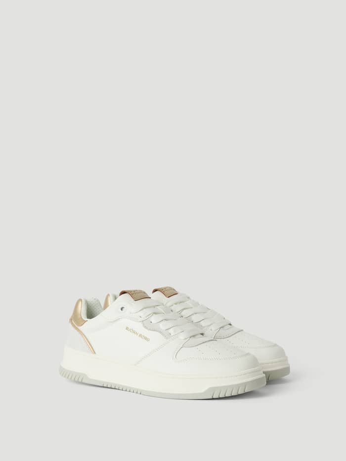 Vita Women's Sneakers T2700 Tennis Low i syntetiskt läder och mocka med snygg passform och metalldetaljer på hälen.