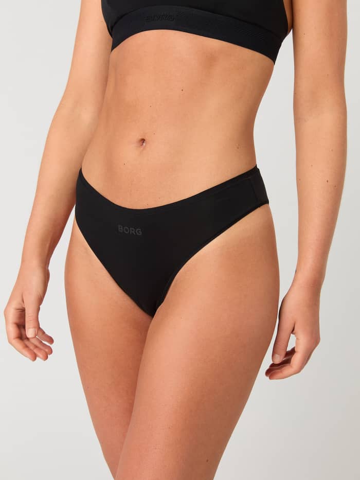 Front view of a model wearing the black Lyocell Cheeky Brief 1-pack, featuring a tonal BORG logo and a soft fit.