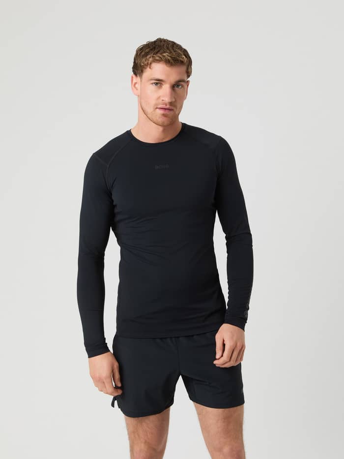 Vooraanzicht van een man in het Borg Soft Compression Ls T-Shirt in Black Beauty (Zwart) voor trainingsprestaties.