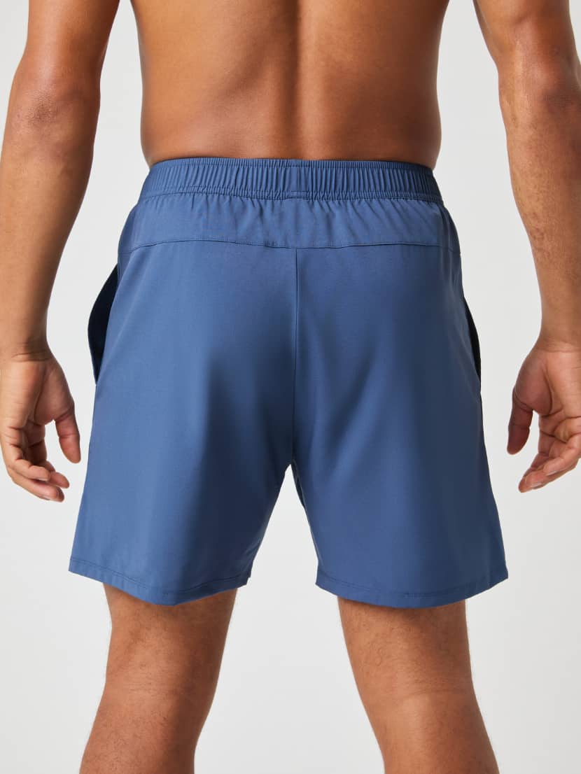 Ace Racquet Shorts 7 Inch i Sargasso Sea (Blå) set bagfra, funktionelle tennisshorts til performance. - Image 3