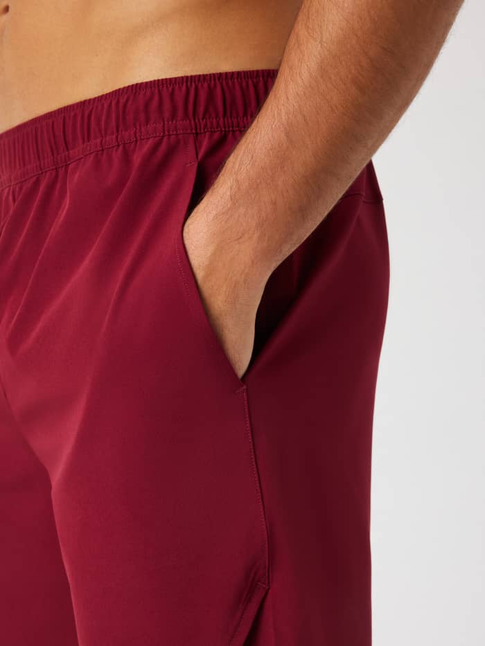 Close-up of the side pocket on the Björn Borg Ace Racquet Shorts 7 Inch in Cabernet (Red) for tennis.