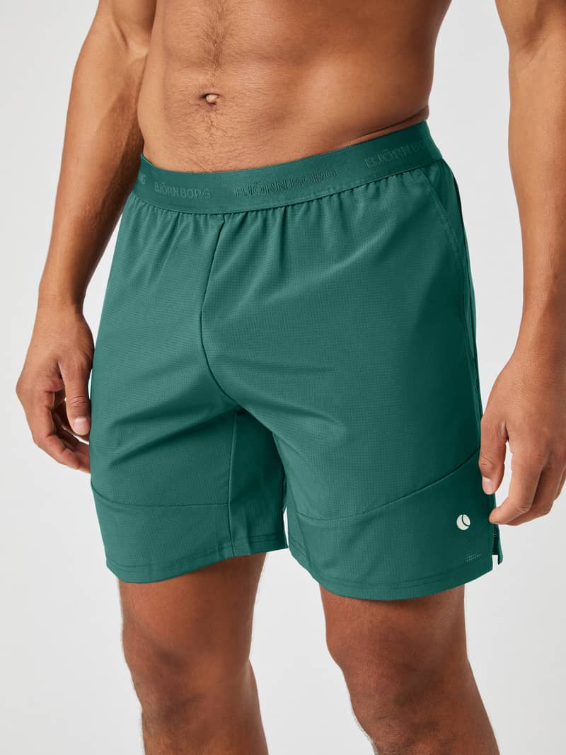 Ace Pro Shorts 7 Inch in Mallard Green (Green) for tennis, featuring a branded waistband and technical perforated fabric.