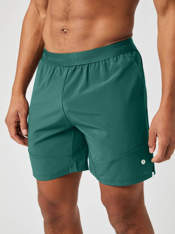 Ace Pro Shorts 7 Inch in Mallard Green (Green) for tennis, featuring a branded waistband and technical perforated fabric.