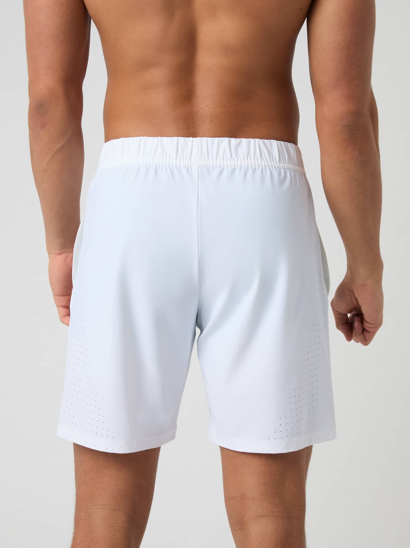 Back view of model wearing Björn Borg Ace Sports Shorts in Brilliant White. - Image 3