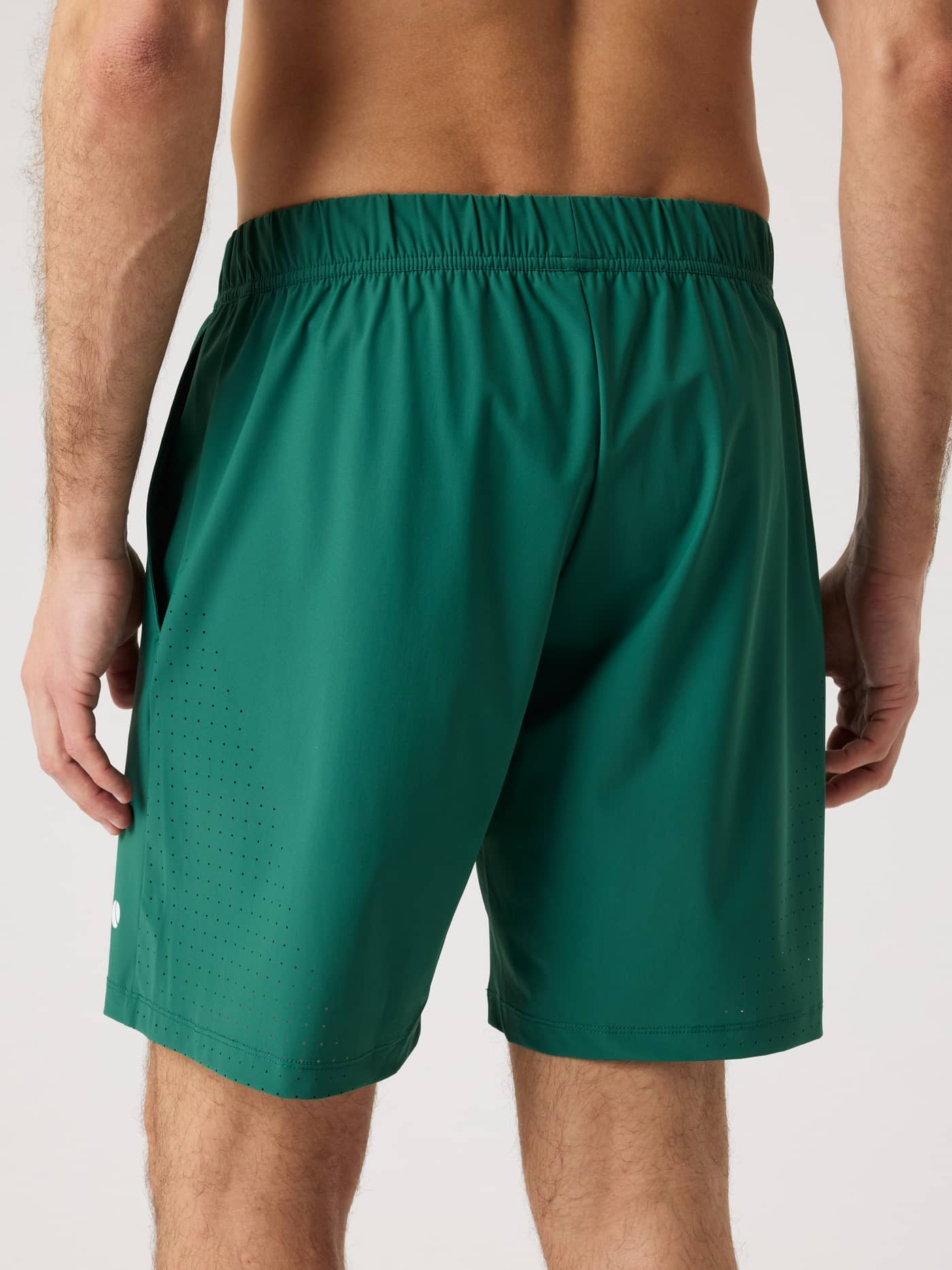 Back view of a man wearing the Björn Borg Ace Sports Shorts 8 Inch in Posy Green (Green), designed for tennis. - Image 2