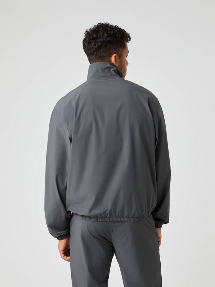 Oversized Björn Borg Ace Track Jacket in Asphalt (Grijs) van polyamide voor tennis, getoond in achteraanzicht. - Image 3