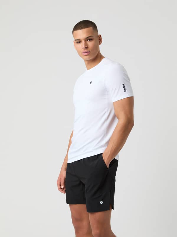 Ace Mesh Panel T-Shirt in Brilliant White (Wit) met meshpanelen voor tennis, getoond in zijaanzicht.