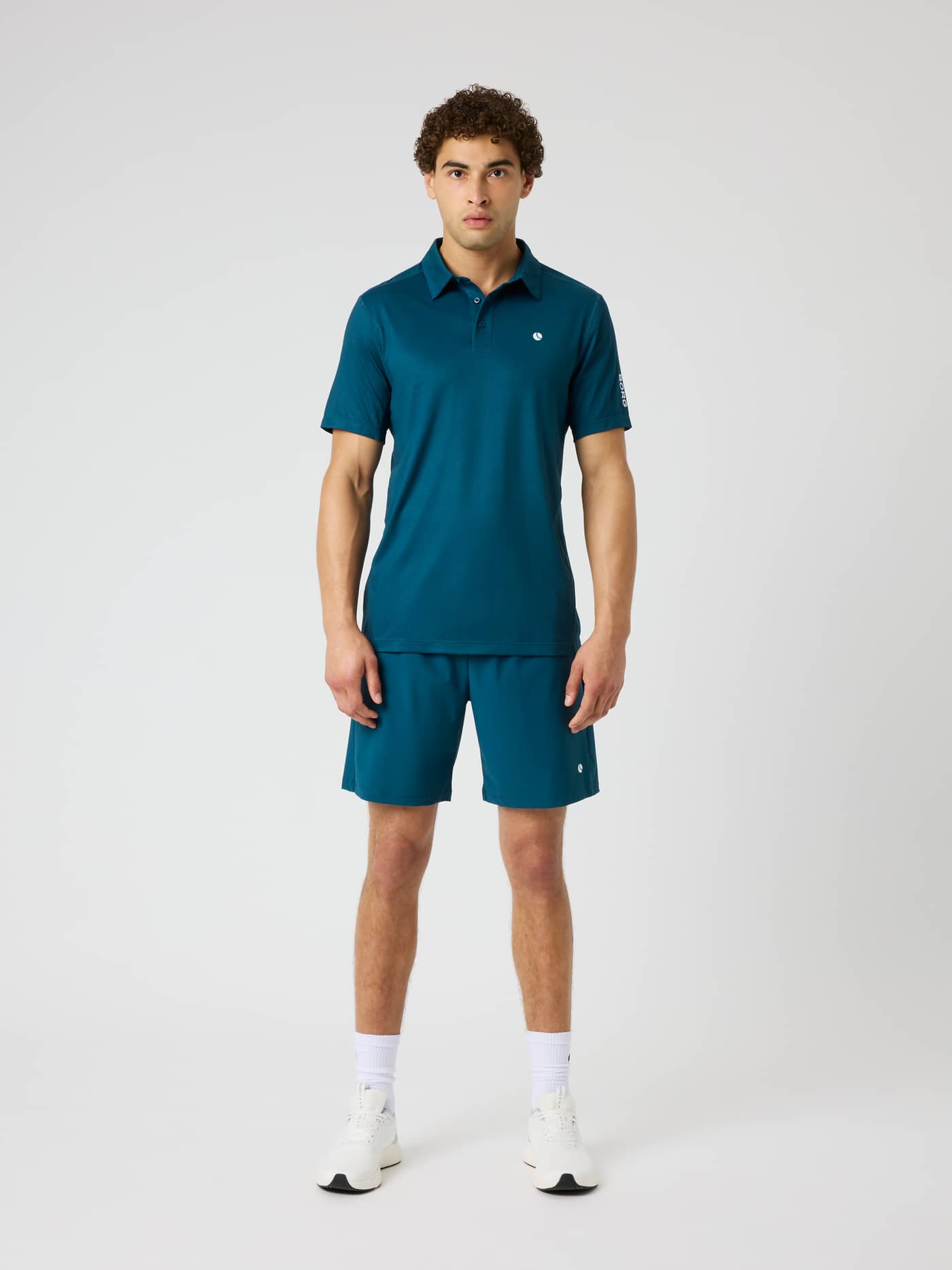 Full-body front view of the Ace Mesh Panel Polo Shirt in Reflecting Pond (Green) for premium tennis and padel training. - Image 3
