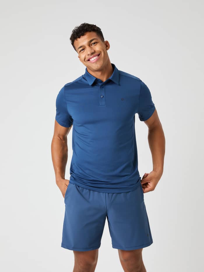 Ace Mesh Panel Polo Shirt in Sargasso Sea (Blauw) in vooraanzicht, een stijlvolle en functionele tennispolo.