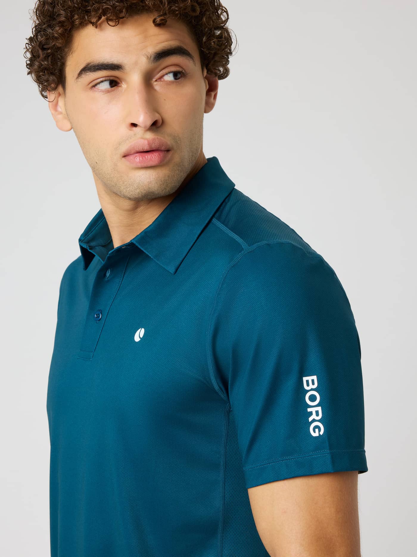 Ace Mesh Panel Polo Shirt in Reflecting Pond (Green) with white logo details and breathable mesh for tennis. - Image 5