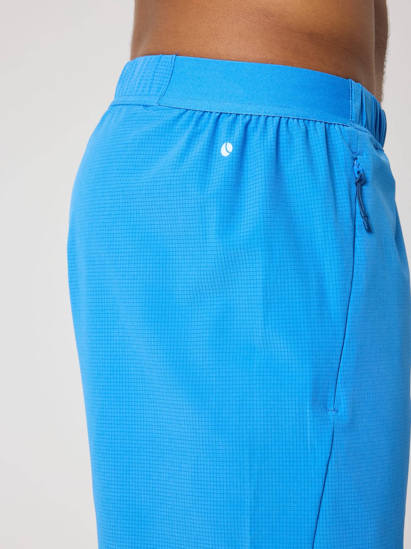Sidedetalje af Borg Zip Shorts 7 Inch i Palace Blue (Blå) med en sikker lynlåslomme til tennis og træning. - Image 5