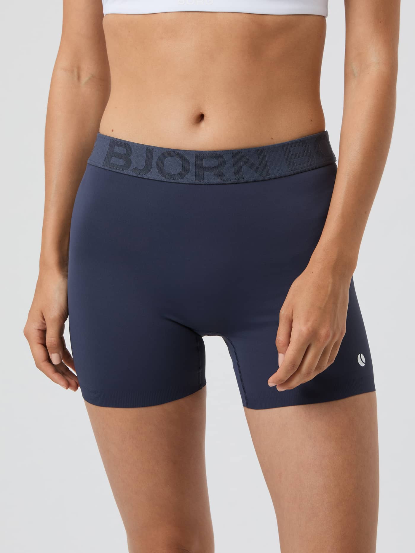 Front view of the Ace Short Shorts in Odyssey Gray (Grey), featuring a high-waisted fit for tennis and training. - Image 1
