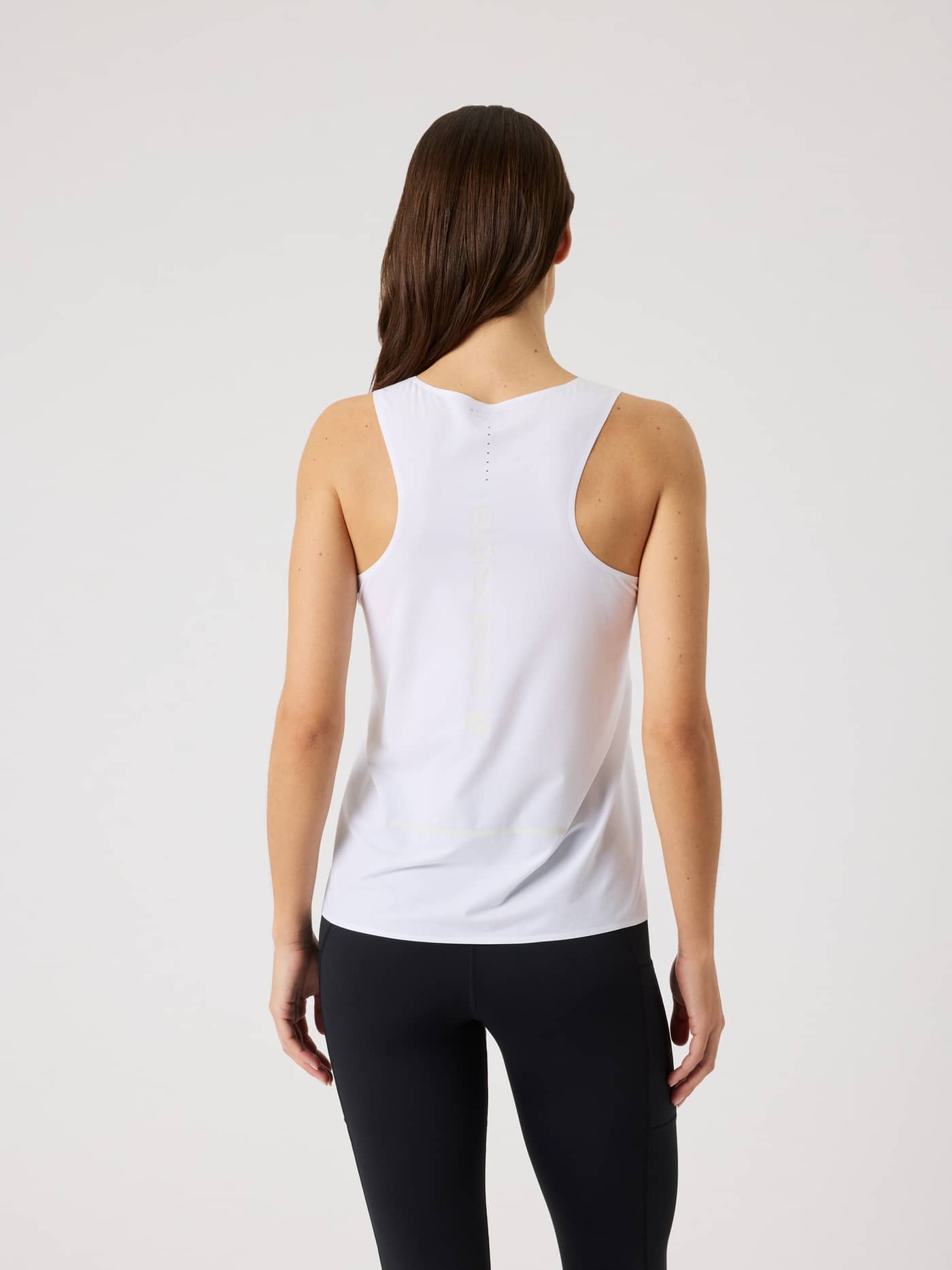 Back view of the Brilliant White (White) Borg Performance Feather Tank with a racerback and white logo for running. - Image 2