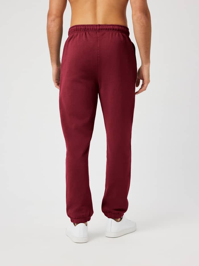 Back view of Borg Classic Sweatpants in Cabernet (red) featuring an elastic waistband and ribbed cuffs.