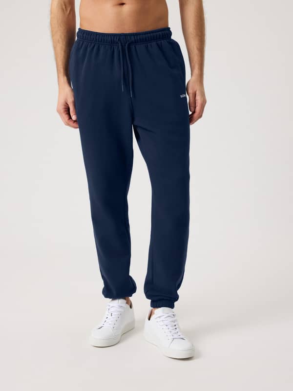 Borg Classic Sweatpants in Dress Blues (blauw) met een verstelbaar trekkoord in de taille en geribde boorden.