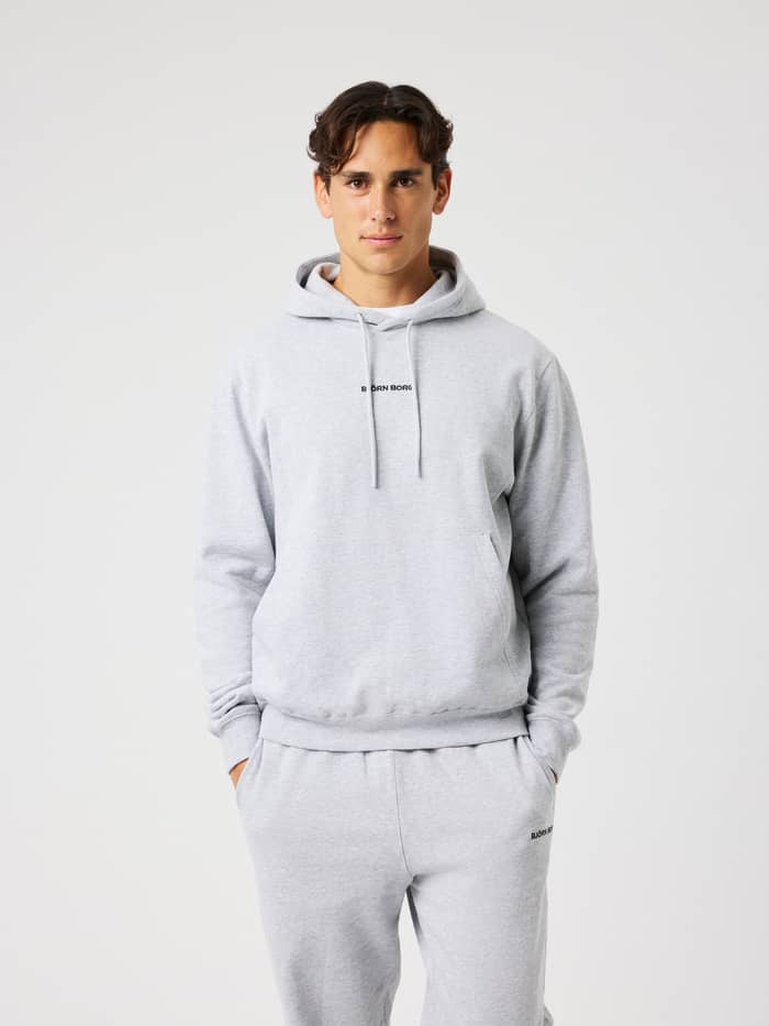Borg Classic Hoodie in Light Grey Melange (Grey) featuring an adjustable hood and black front logo for training.