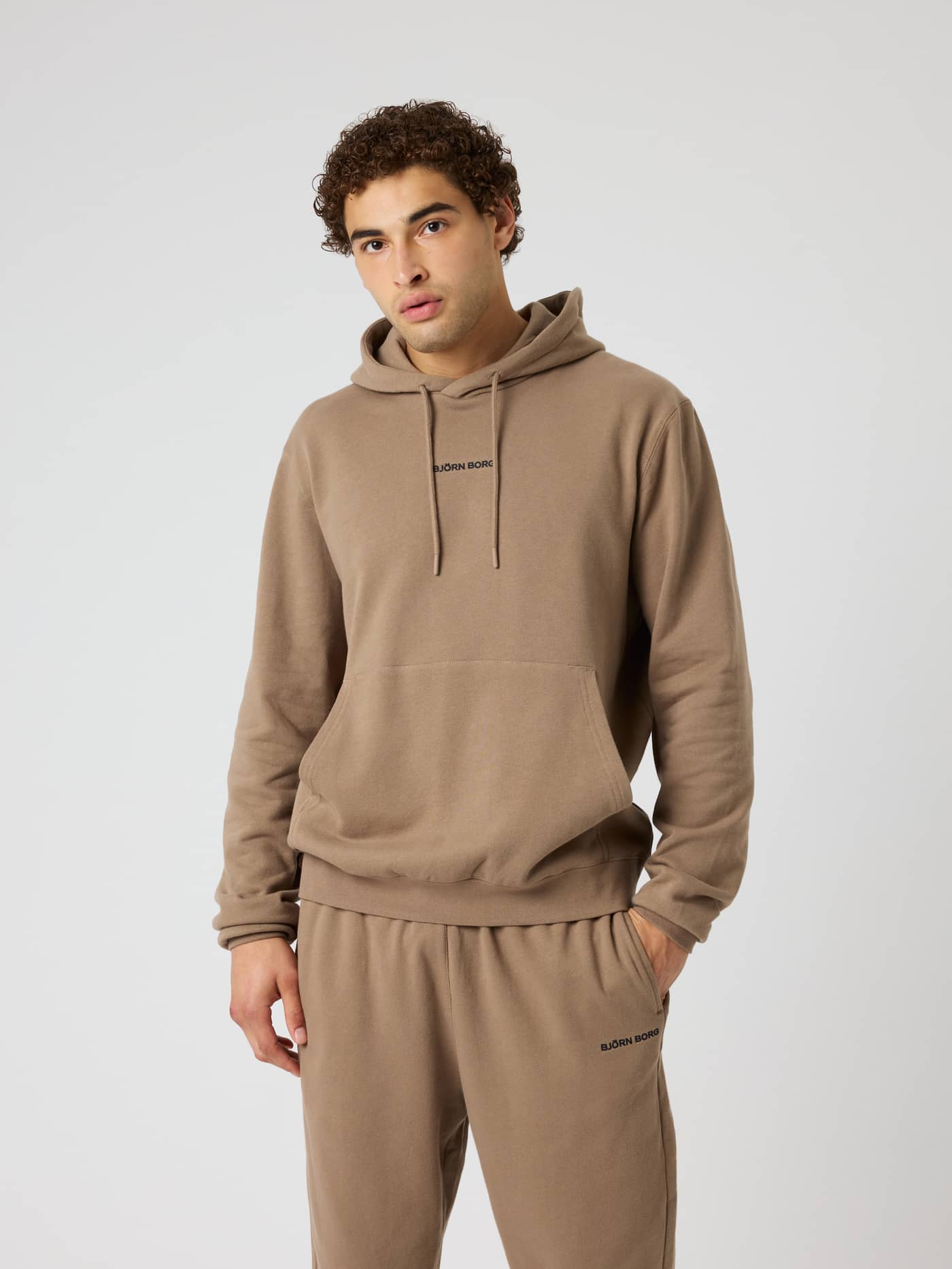 Borg Classic Hoodie in Caribou (Brown) featuring a cotton finish and kangaroo pocket, ideal for training and daily wear. - Image 1