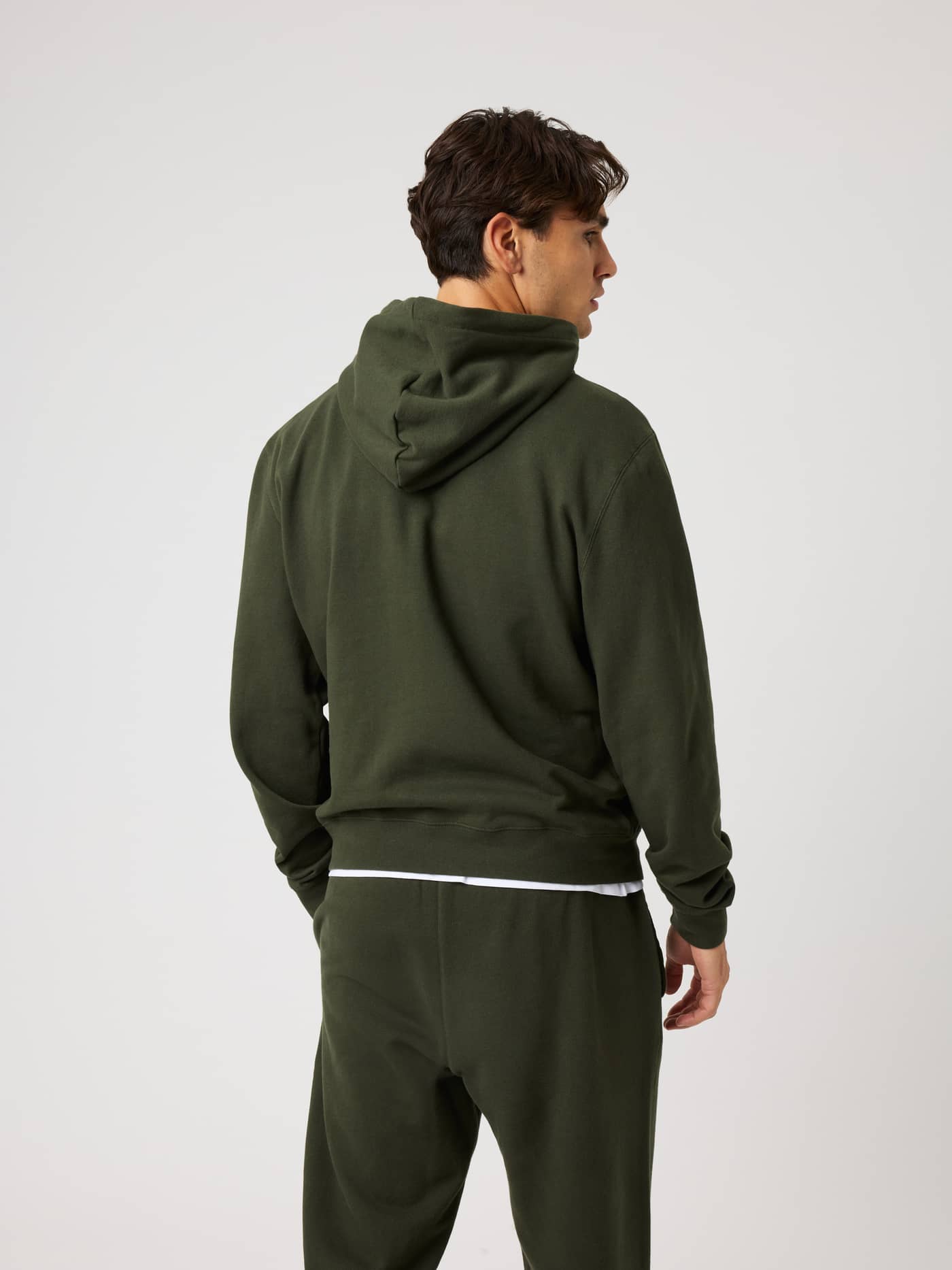 Back view of the Borg Classic Hoodie in Rosin (Green), featuring soft cotton French terry for training. - Image 2