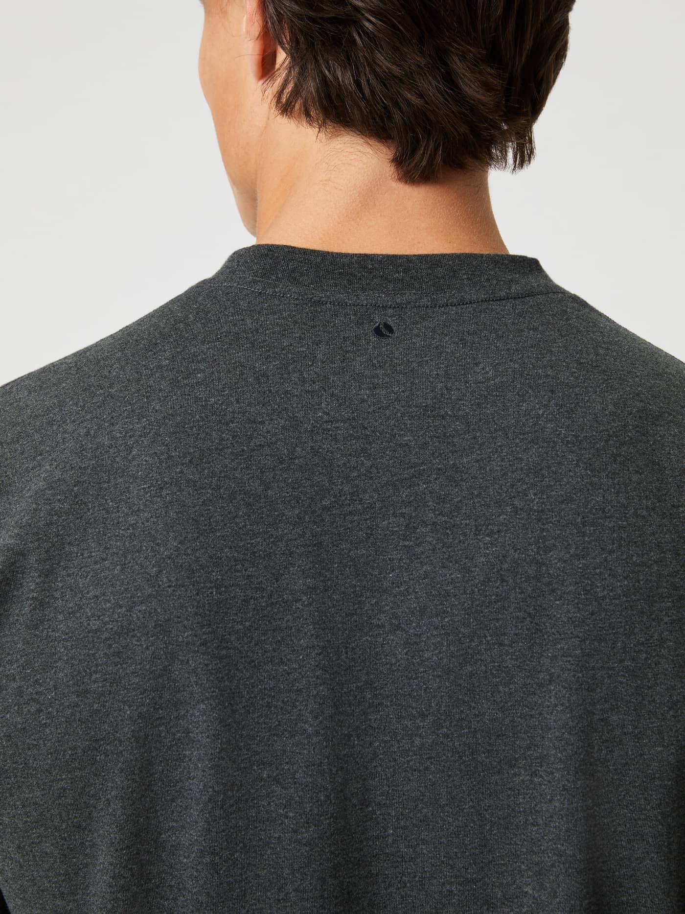 Borg Classic T-Shirt in Dark Gray Melange (Grey) made of high-quality cotton with a dark tennis ball logo on the back. - Image 5