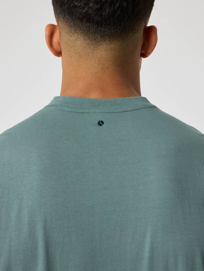 Back view of the cotton Borg Classic T-Shirt in Balsam Green (Green) featuring a small embroidered tennis logo. - Image 5