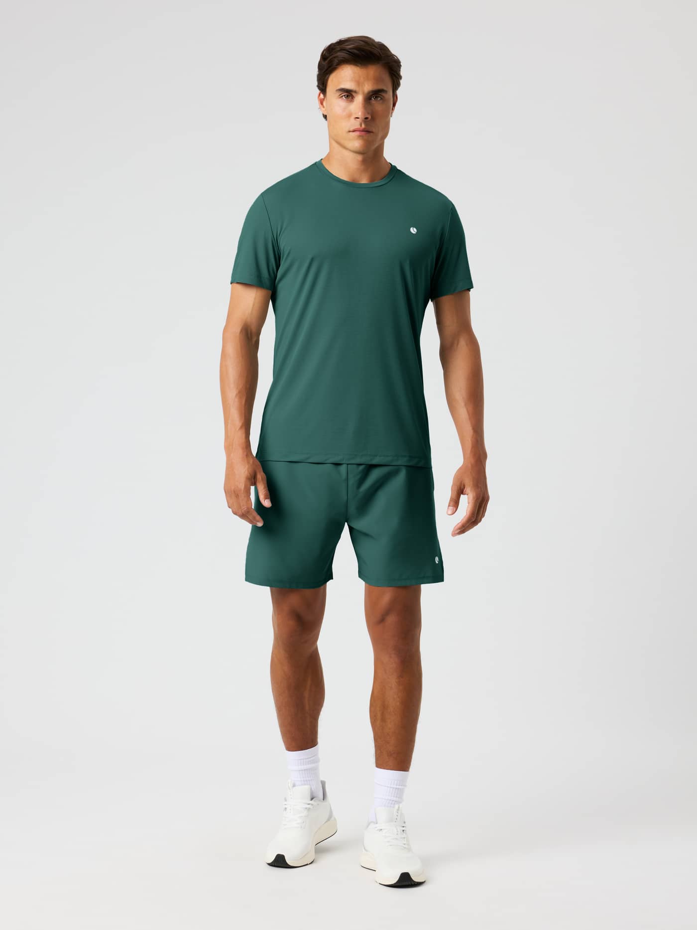 Front view of the Ace Light T-Shirt in Mallard Green (Green) with a white chest logo for tennis training. - Image 3