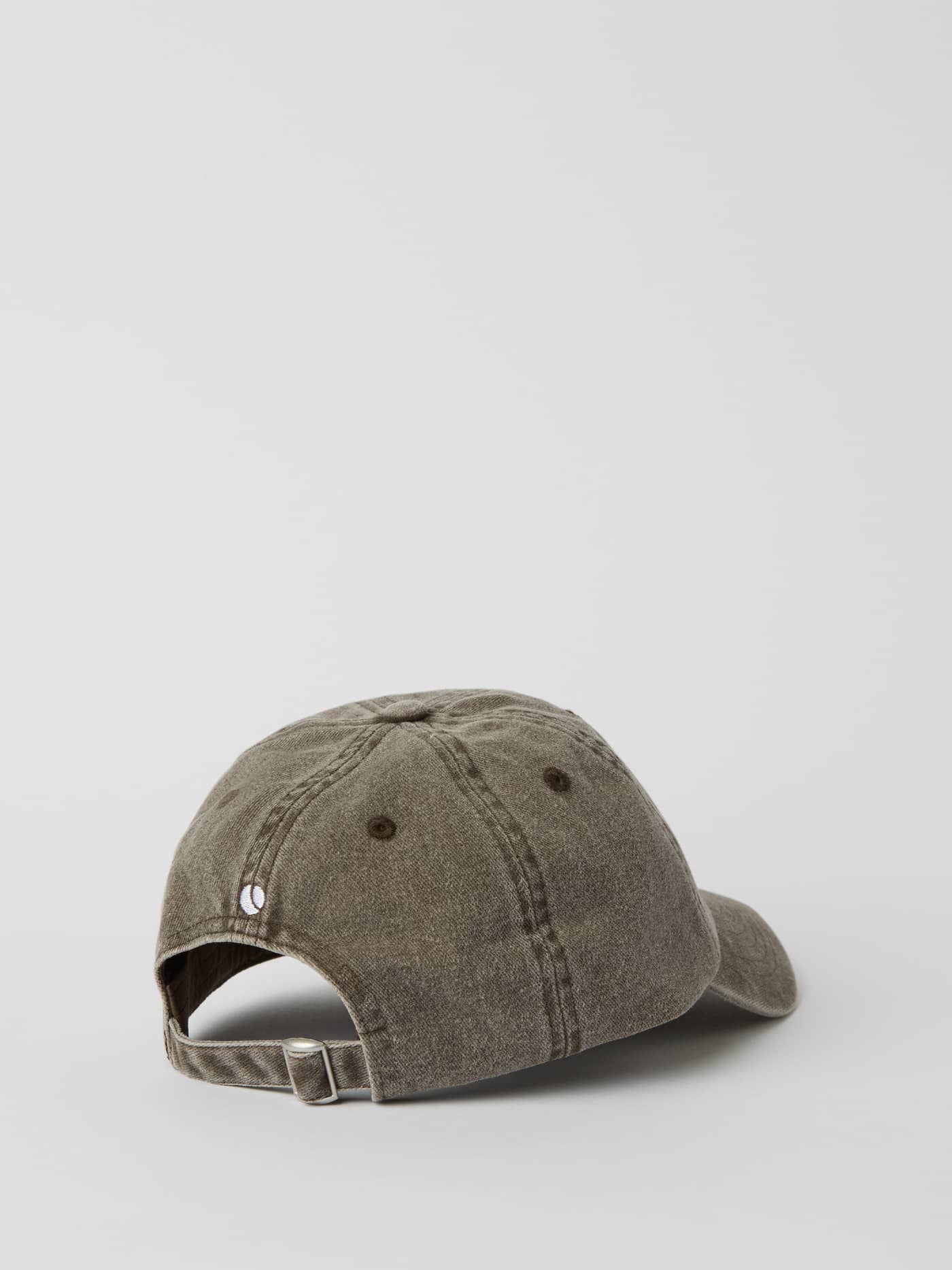 Back view of the organic cotton Borg Washed Cap in Brushed Nickel (Grey) with a classic metal buckle enclosure. - Image 3