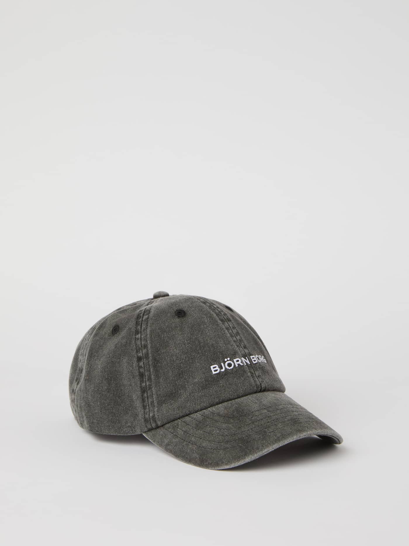 Vue de face de la Borg Washed Cap Black Beauty (Noir) en coton biologique pour le tennis, le running et le training. - Image 1