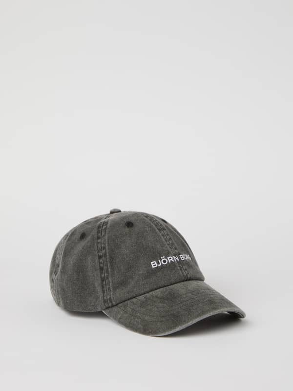 Vue de face de la Borg Washed Cap Black Beauty (Noir) en coton biologique pour le tennis, le running et le training.