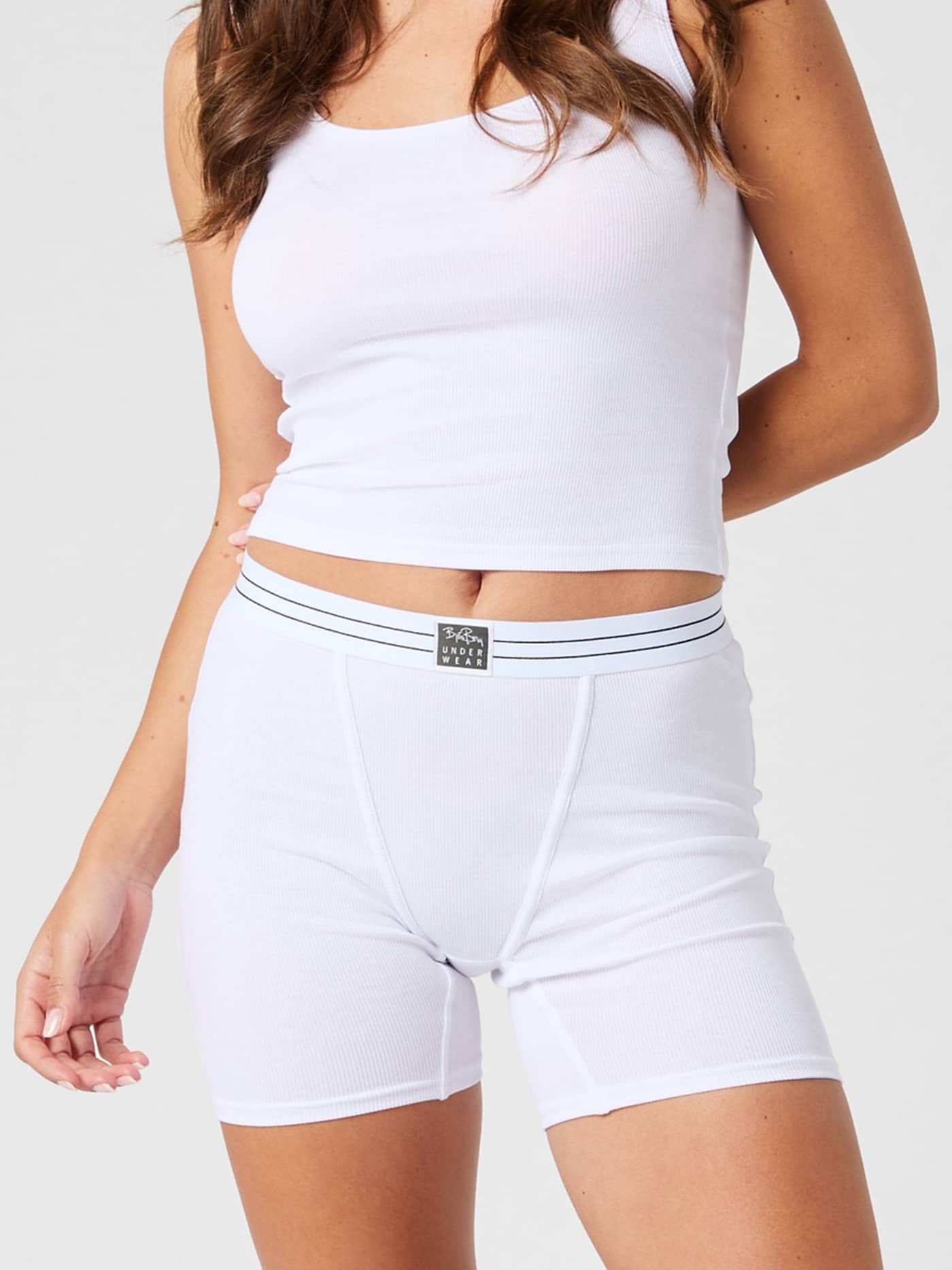 Vooraanzicht van een vrouw in de slim-fit Original Rib Tank in Brilliant White (Wit) van zacht geribde katoen. - Image 4