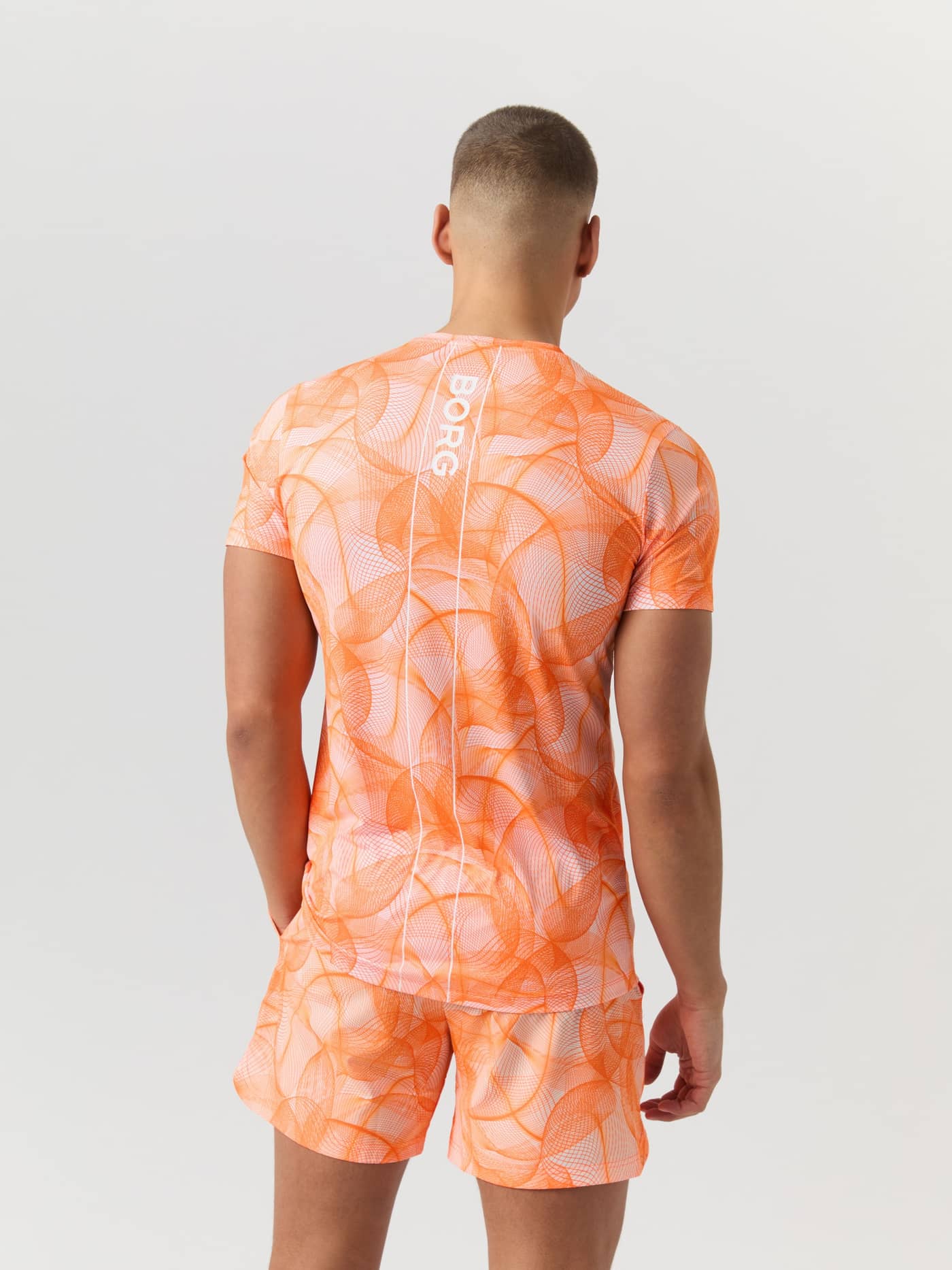 Ace Printed T-Shirt i Big Grid 2 (Orange) set bagfra med hvidt logo og tennisprint til herrer. - Image 2