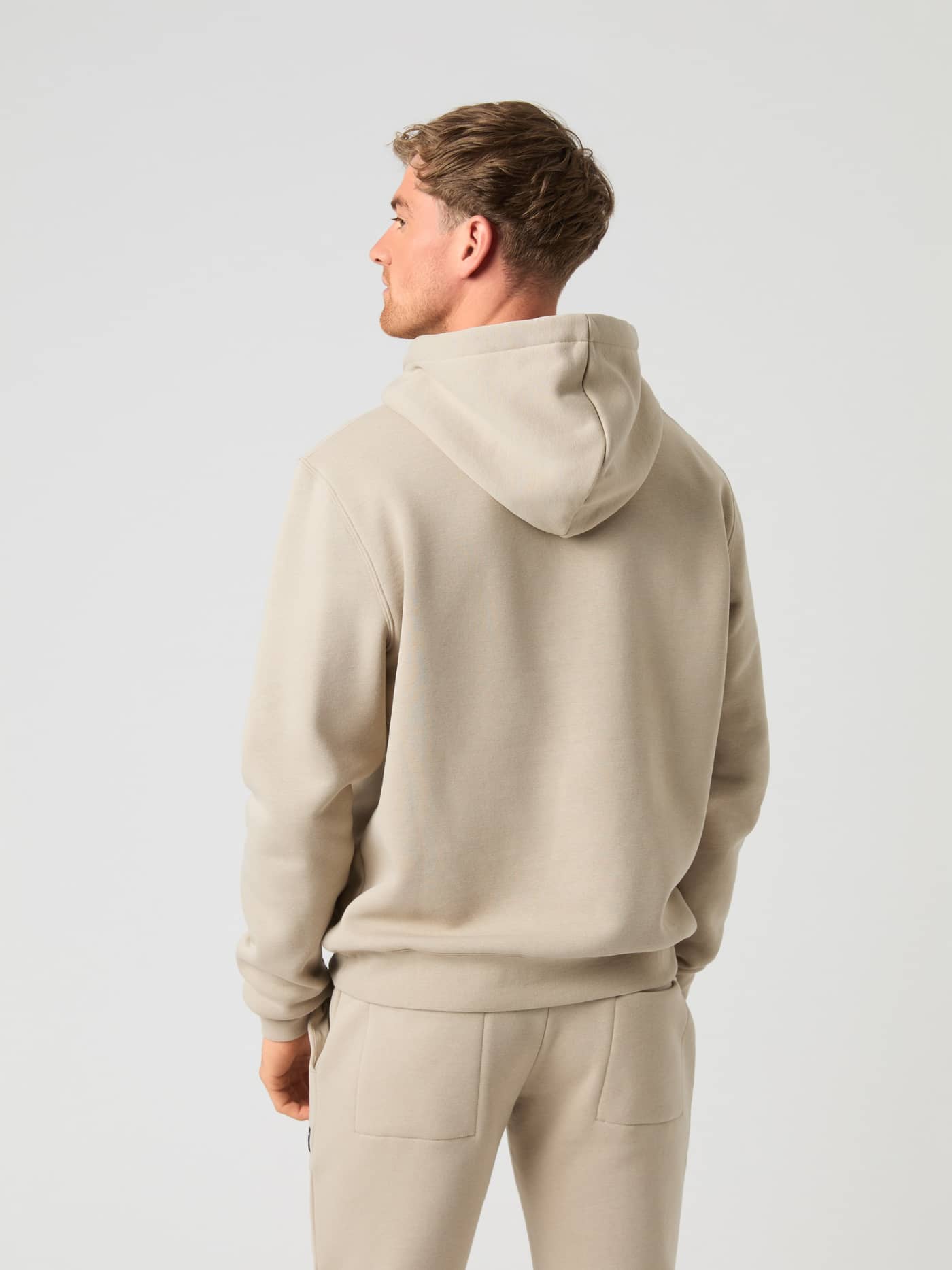 Back view of a model wearing the Björn Borg Centre Hoodie in Pure Cashmere. - Image 2