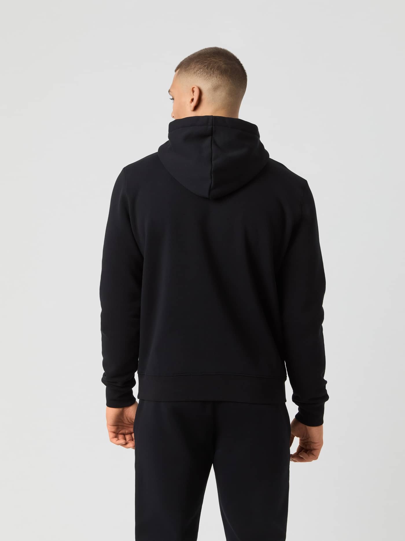 Achteraanzicht van de Björn Borg Centre Hoodie in Black Beauty (Zwart) met een stijlvolle en functionele pasvorm. - Image 2
