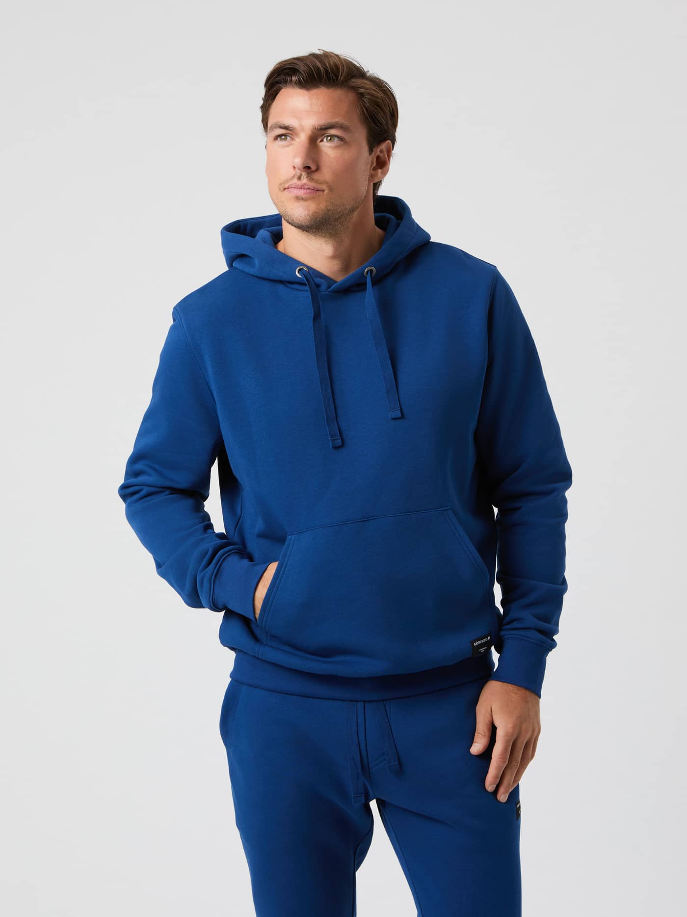 Front view of male model wearing the Björn Borg Centre Hoodie in Estate Blue. - Image 2