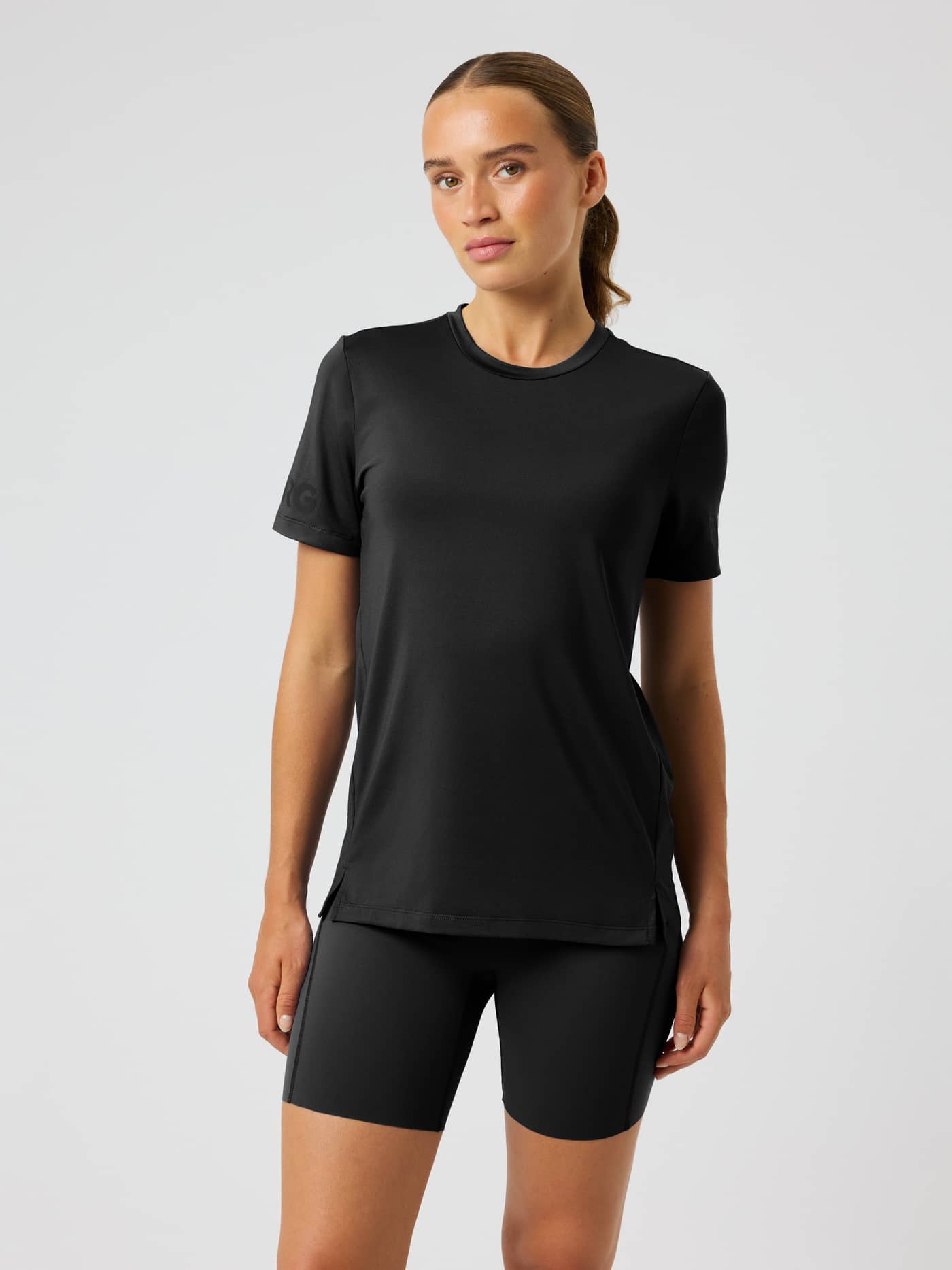Front view of the Borg T-Shirt in Black Beauty (Black), a regular-fit training top with black sleeve logos and side slits. - Image 2