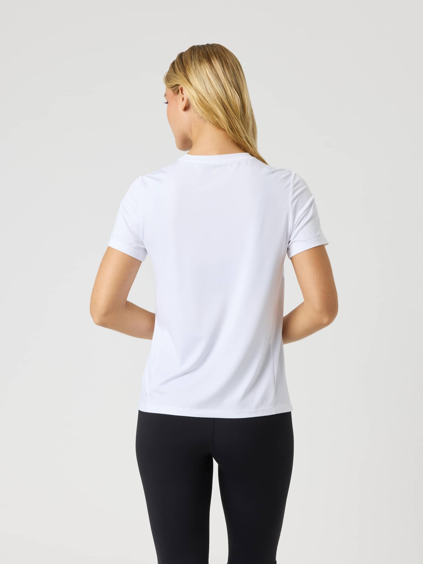 Back view of the Borg T-Shirt in Brilliant White (White), a short-sleeved women's training and tennis top in a regular fit. - Image 2