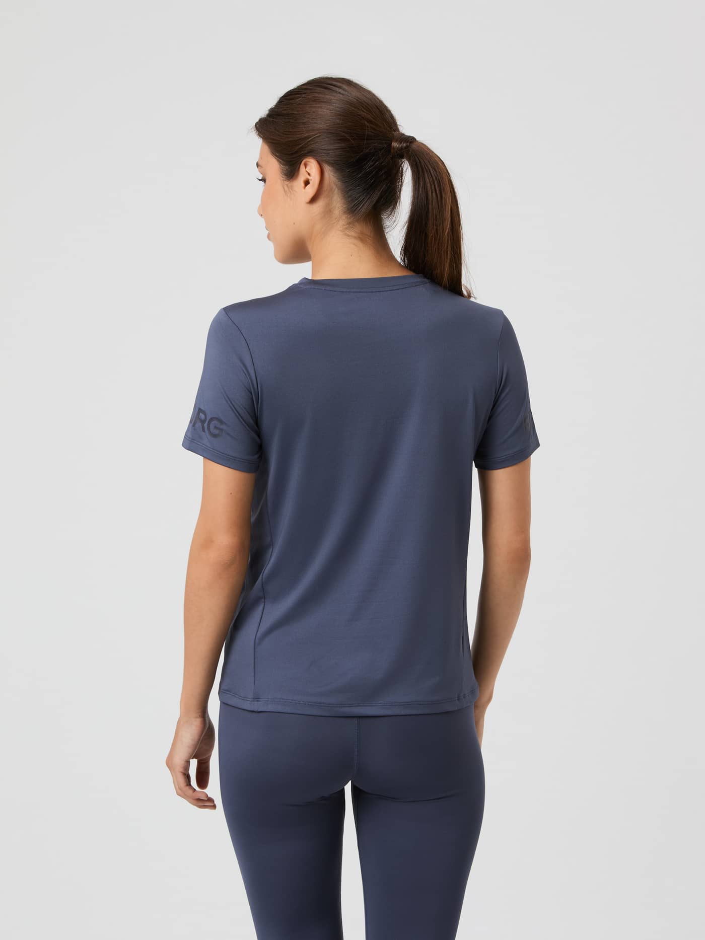 Back view of a model wearing the Björn Borg Borg T-shirt in Odyssey Gray. - Image 2