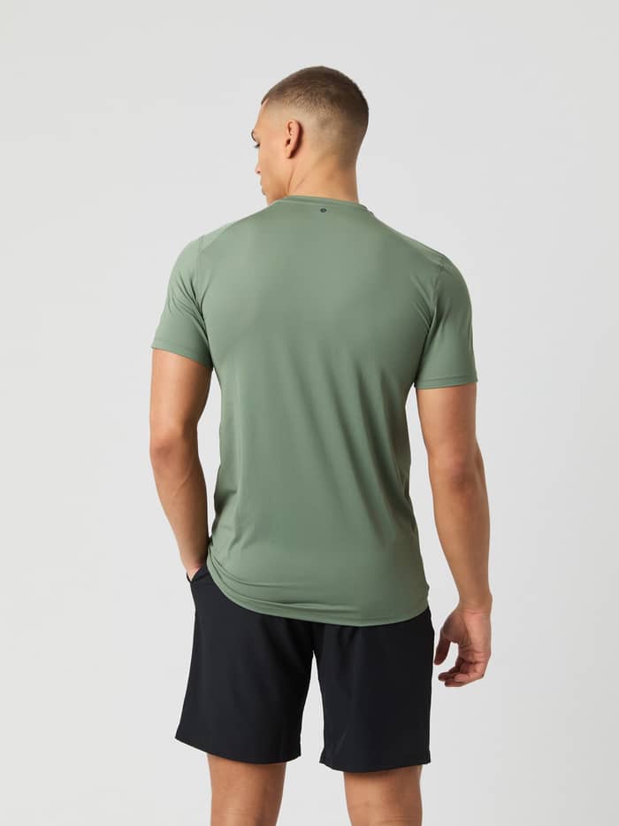 Back view of a model wearing the Björn Borg Athletic T-Shirt in Agave Green.