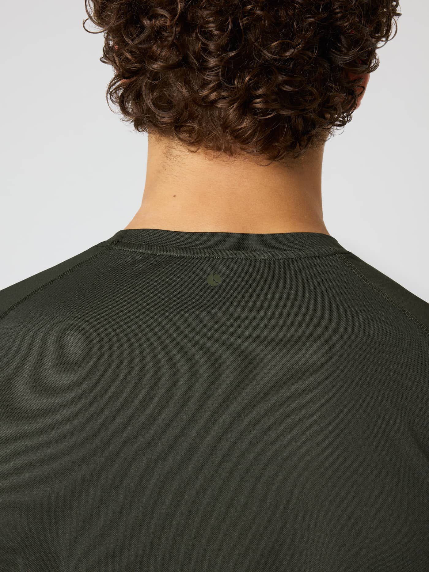 Back view of the Borg Athletic T-Shirt in Rosin (Green) featuring a tonal tennis ball print for training. - Image 5
