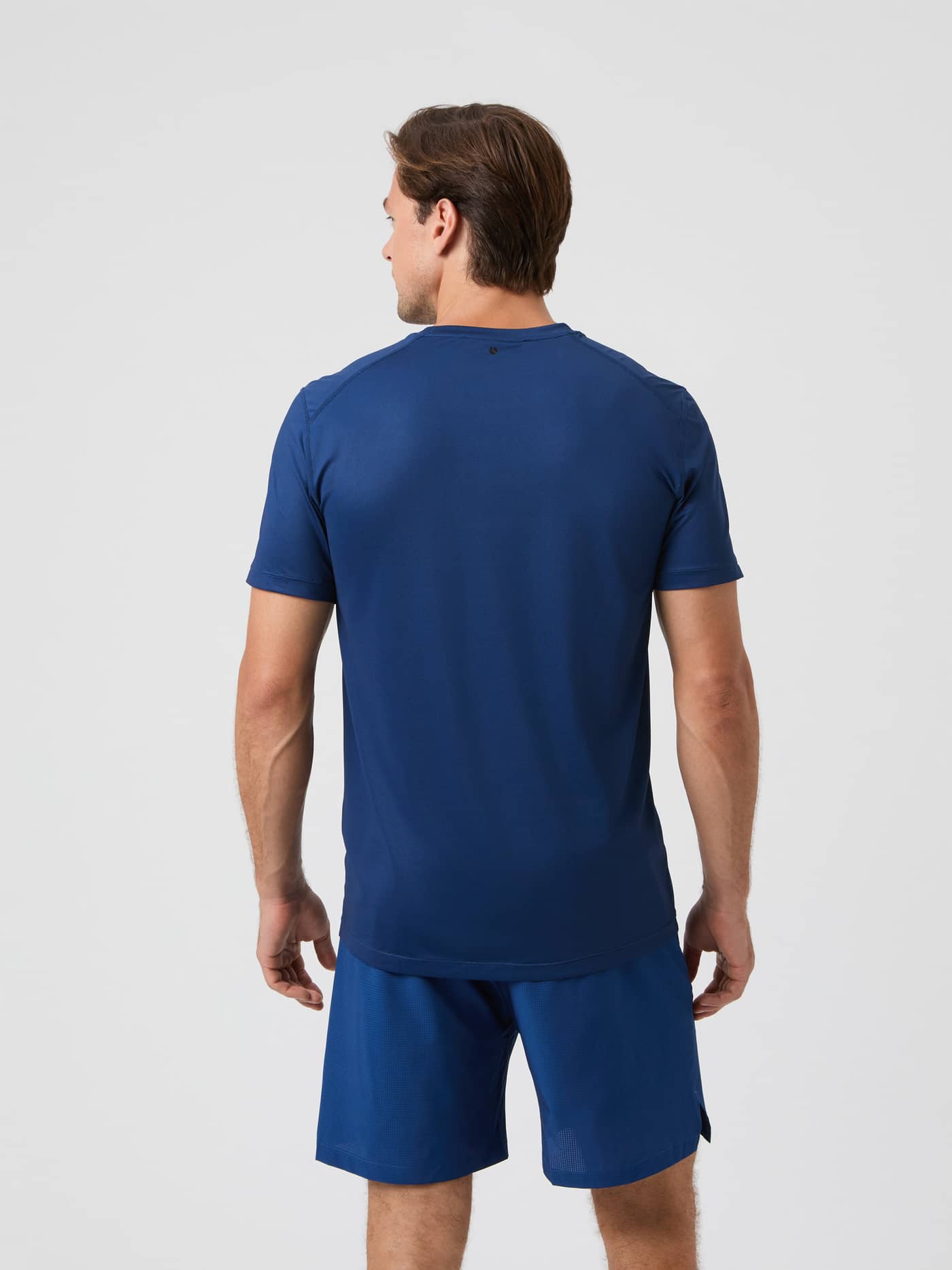 Back view of the Borg Athletic T-Shirt in Estate Blue on a model. - Image 2