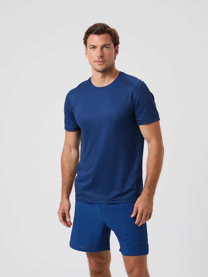 Front view of a man wearing the Björn Borg Athletic T-Shirt in Estate Blue.