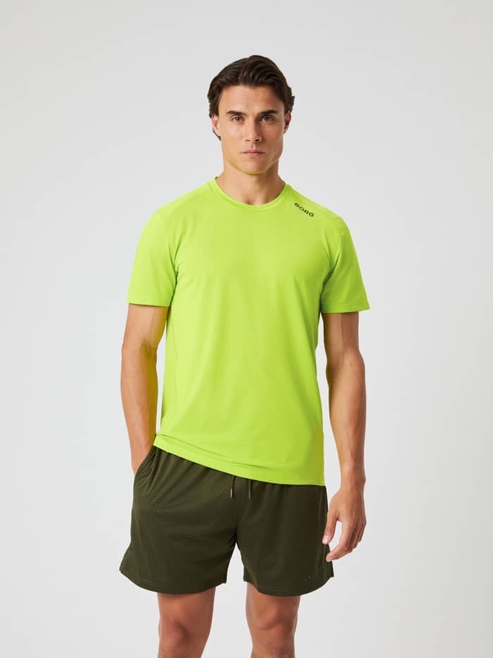 Borg Athletic T-Shirt i Acid Lime (Grøn) set forfra til træning med et sort logo og funktionelt design. - Image 1