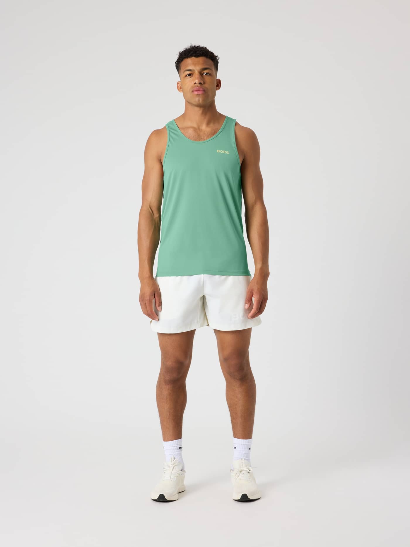 Full-body front view of a man wearing the Björn Borg Athletic Tank in Malachite Green (Green) for training. - Image 3
